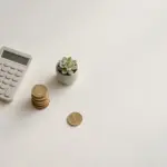 Calculator and coins — n8n self-hosting costs