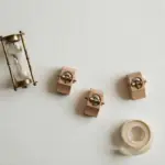 Brass hourglass and tally counters — counting Make credits