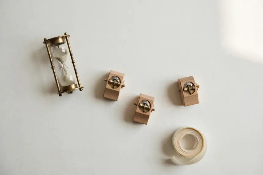 Brass hourglass and tally counters — counting Make credits