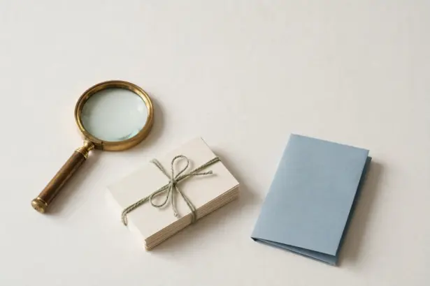 Vintage magnifying glass with research report and index cards — comparing AI research tools