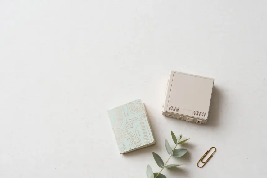 Small pastel server tower with notebook — n8n hosting options compared